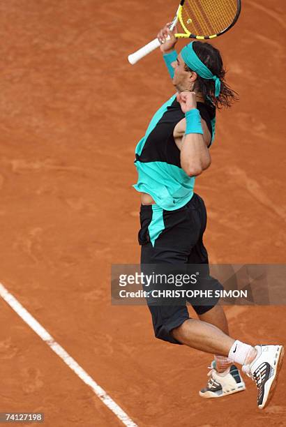 Spain's Rafael Nadal jubilates after he won against his opponent Serb Novak Djokovic during his quarter final at the Rome's Italian open 11 May 2007....