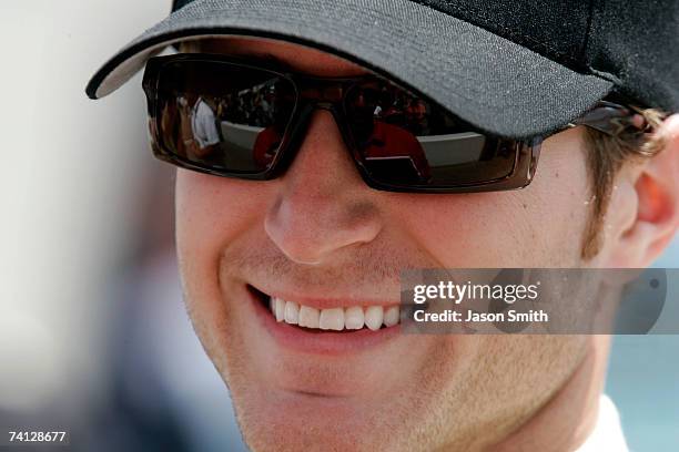 Kasey Kahne, driver of the Dodge Dealers/UAW Dodge, smiles while standing on pit road, during qualifying for the NASCAR Nextel Cup Series Dodge...