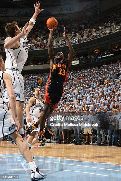 Jason Richardson of the Golden State Warriors shoots a jumper against Deron Williams of the Utah Jazz in Game Two of the Western Conference...