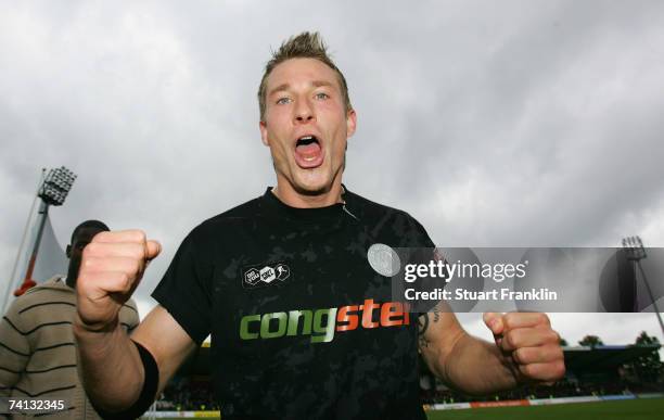 Marvin Braun of St. Pauli celebrates promotion at the end of the Third League Northern Division match between FC St.Pauli and Fortuna Dusseldorf at...