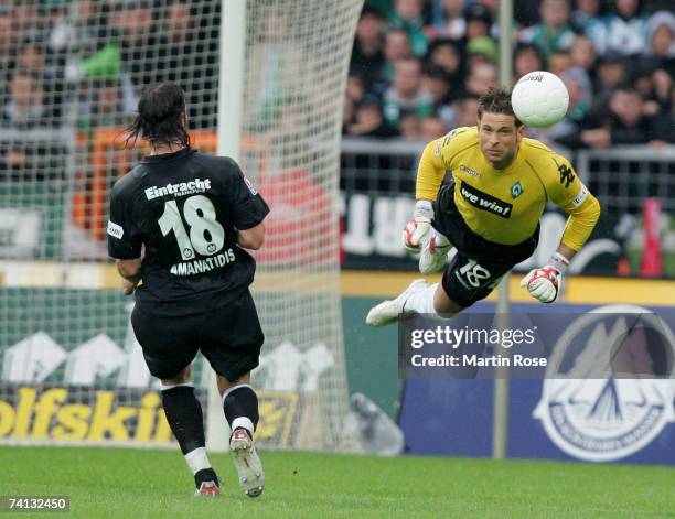 Tim Wiese goalkeeper of Bremen saves the ball during the Bundesliga match between Werder Bremen and Eintracht Frankfurt at the Weserstadion on May...
