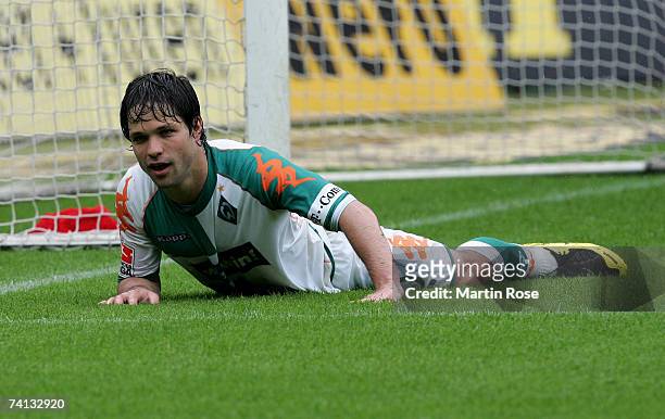 Diego of Bremen lies on the pitch during the Bundesliga match between Werder Bremen and Eintracht Frankfurt at the Weserstadion on May 12, 2007 in...