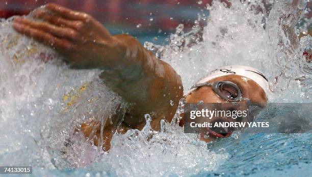 Manchester, UNITED KINGDOM: Natalie Du Toit of South Africa performs in the womens 100m freestyle final during a Paralympic world cup at the...