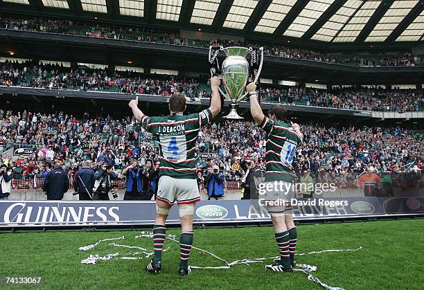 Leicester brothers, Brett Deacon and Louis Deacon parade the trophy to the fans following their team's victory during the Guinness Premiership final...