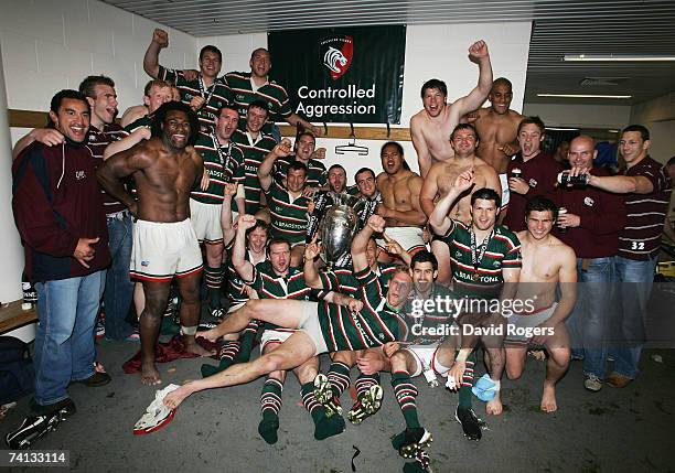 Leicester players celebrate in the changing room after winning the trophy during the Guinness Premiership final between Gloucester and Leicester...