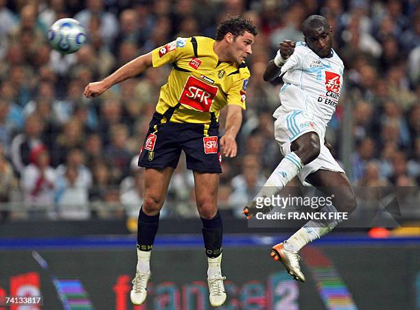 Marseille's Senegalese forward Mamadou Niang vies with Sochaux's midfielder Karim Ziani during the French cup final football match Marseille vs....