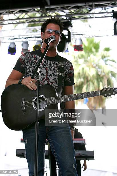 Musician Chris "Abby" Abbondanza of the band "PovertyNeck Hillbillies" performs onstage during day one of the Academy of Country Music All Star...