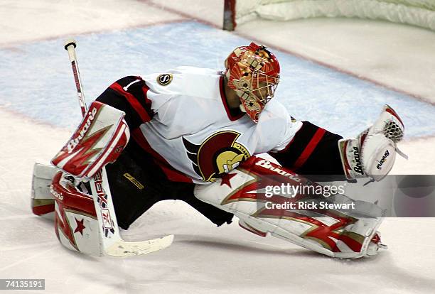 Goaltender Ray Emery of the Ottawa Senators makes a save during the first over-time period of Game 2 of the 2007 Eastern Conference Finals against...