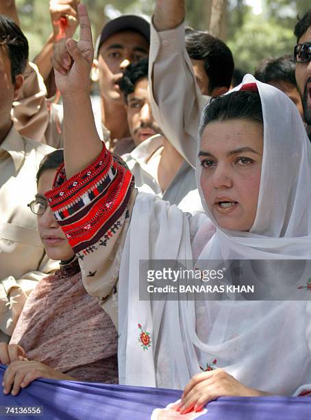 Activists of Pakistani nationalist party shout slogans during a march in Quetta, 13 May 2007, against the army operation in the Baluchistan province....