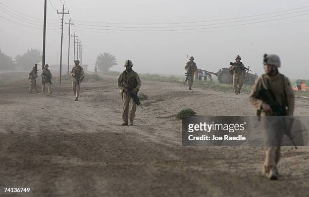 Marines of Golf Company 2 battalion, 7th Marines during a security patrol May 13, 2007 in the area known as Zaidon in the Al Anbar province near...