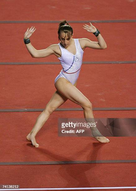 Emilie Le Pennec of France competes in floor exercices during the World Cup Gymnastics's final at Gent's topsporthal, 13 May 2007, in Belgium. AFP...