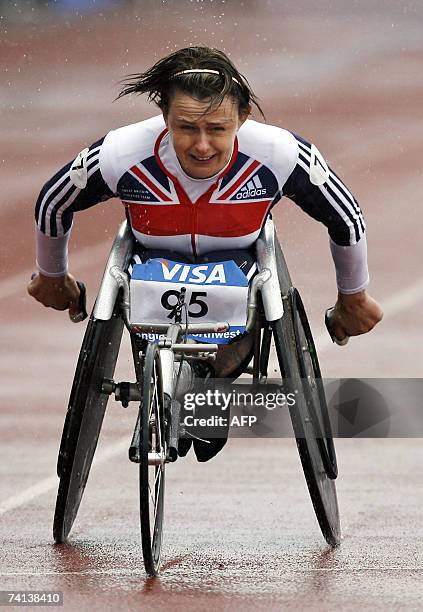 Manchester, UNITED KINGDOM: Tanni Grey-Thompson performs during her last ever race in the T53 200 meters during the Visa Paralympic world cup at the...