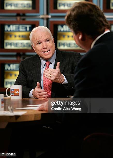 Republican U.S. Presidential hopeful Sen. John McCain speaks as he is interviewed by moderator Tim Russert during a taping of "Meet the Press" at the...