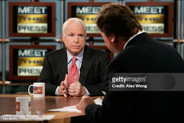 Republican U.S. Presidential hopeful Sen. John McCain speaks as he is interviewed by moderator Tim Russert during a taping of "Meet the Press" at the...