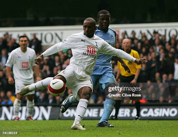 Jermain Defoe of Tottenham fails to drive home the rebound from the his penalty, that was saved by Andreas Isaksson of City during the Barclays...