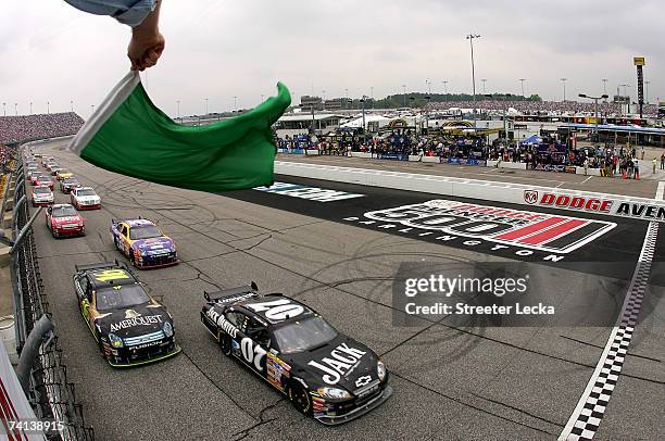 Clint Bowyer, driver of the Jack Daniel's Chevrolet, leads Greg Biffle, driver of the Ameriquest Ford, and the rest of field to the green flag to...