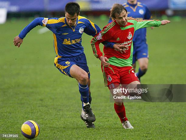 Milan Vjestica of FC Rostov and Dmitri Sychev of Lokomotiv Moscow compete for the ball uring the Russian Premier League Championship between...