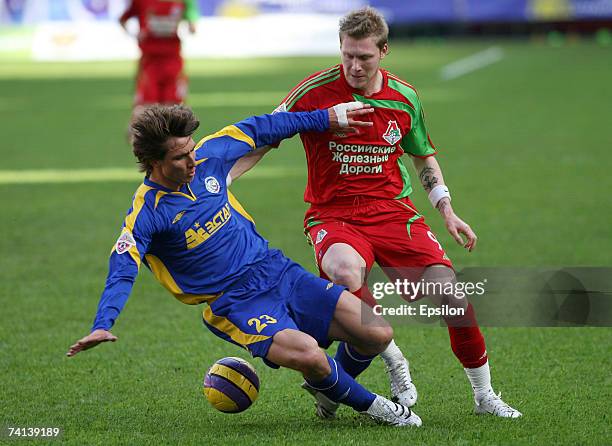 Sergei Bendz of FC Rostov and Garry O'Connor of Lokomotiv Moscow compete for the ball during the Russian Premier League Championship between...