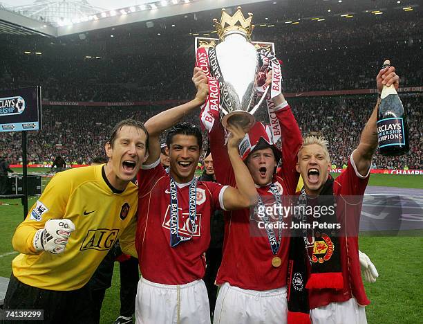 Edwin van der Sar, Cristiano Ronaldo, Wayne Rooney and Alan Smith of Manchester United celebrate winning the Barclays Premiership after the Barclays...