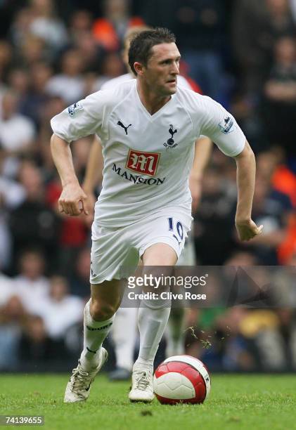 Robbie Keane of Tottenham runs with the ball during the Barclays Premiership match between Tottenham Hotspur and Manchester City at White Hart Lane...