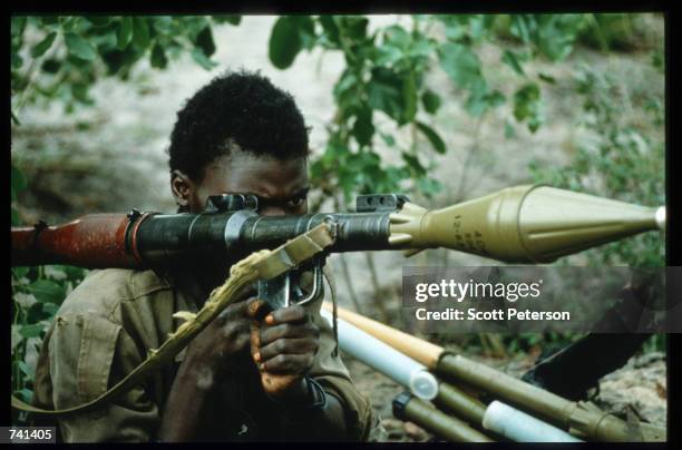 Soldier holds an anti-tank weapon January 23, 1990 near Jamba, Angola. The National Union for the Total Independence of Angola and the Marxist forces...