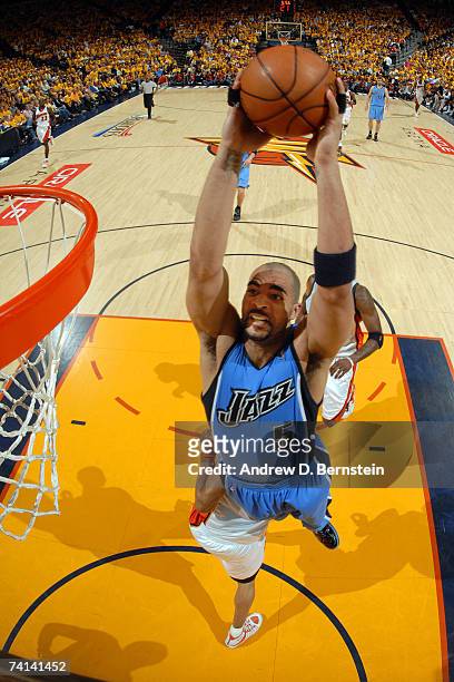 Carlos Boozer of the Utah Jazz dunks against the Golden State Warriors in Game Four of the Western Conference Semifinals during the 2007 NBA Playoffs...