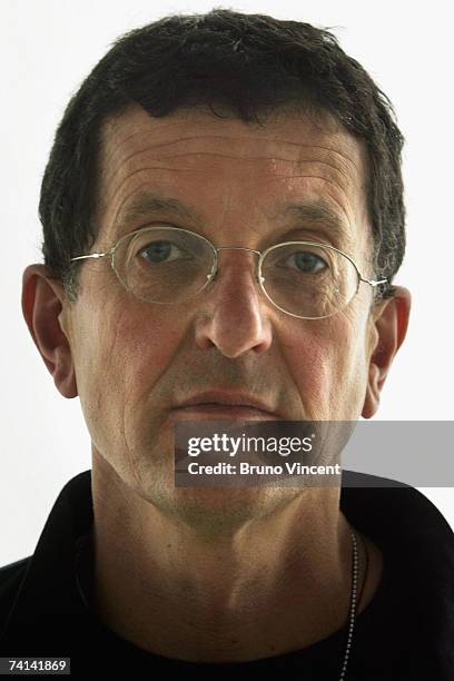 Anthony Gormley poses for photographers within his 'Blind Light' installation at the Hayward Gallery on May 14, 2007 in London. Oscillating...