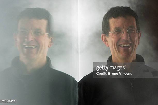 Anthony Gormley poses for photographers within his 'Blind Light' installation at the Hayward Gallery on May 14, 2007 in London. Oscillating...