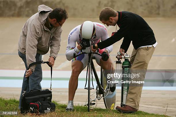 Chris Hoy of Great Britain takes on oxygen assisted by Doctor Kenneth Baillie after his failed attempt to break the World 1 Kilometre Altitude Record...