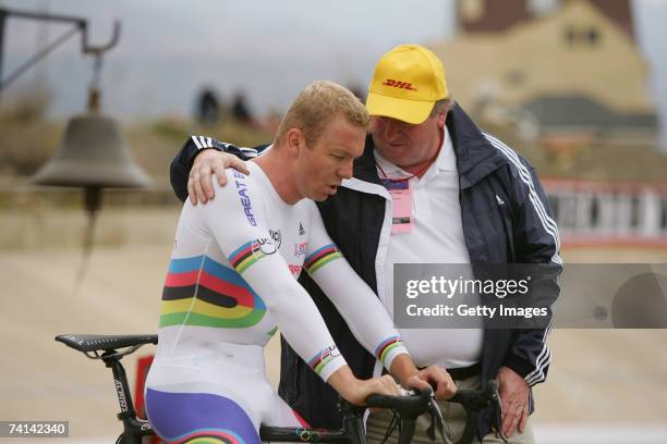 Chris Hoy of Great Britain is consoled by his father David Hoy after his failed attempt to break the World 1 Kilometre Altitude Record at the Alto...