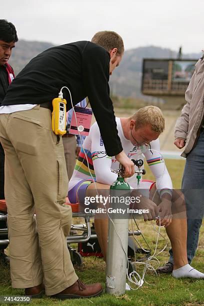Chris Hoy of Great Britain takes on oxygen assisted by Doctor Kenneth Baillie after his failed attempt to break the World 1 Kilometre Altitude Record...