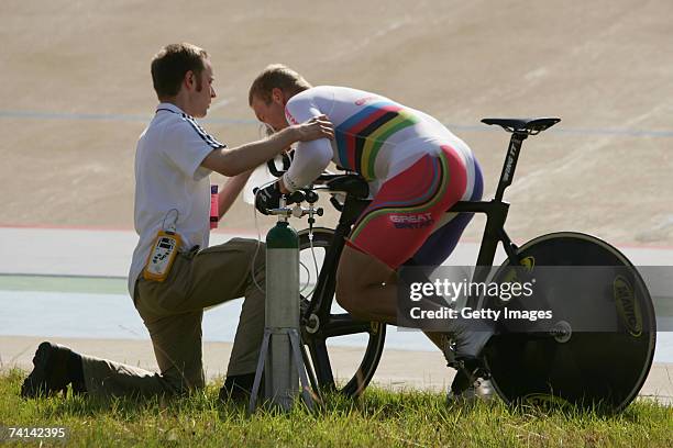 Chris Hoy of Great Britain is administered oxygen by Doctor Kenneth Baillie after failing in his attempt to break the World 1 Kilometre Altitude...