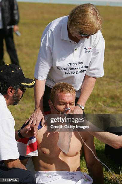 Chris Hoy of Great Britain is administered oxygen and comforted by his mother Carol Hoy after failing in his attempt to break the World 1 Kilometre...