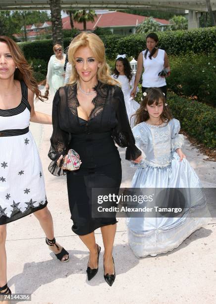 Cristian Solis and daughter Alison and Janine arrive for Charytin Goyco's dream wedding at Walt Disney World at the Grand Floridian wedding pavilion...