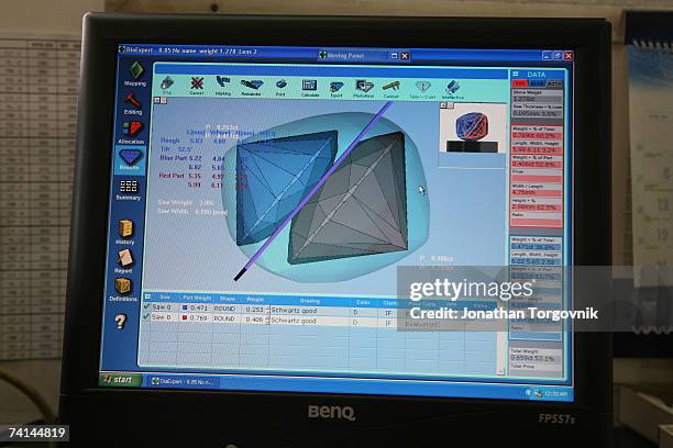 Large rough diamond is evaluated by a 3D computer software analyzing the optimal cut for the diamond, at one of the trading companies at the giant...