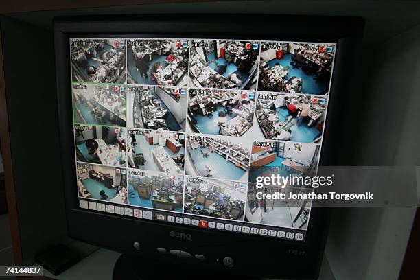Security camera monitors at one of Israel's diamond cutting factories November, 2005 in Ramat-Gan, Israel. Cutting a rough diamond takes great skill....
