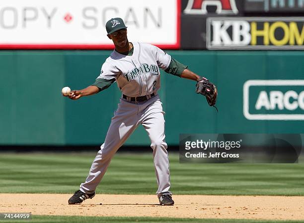 Upton of the Tampa Bay Devil Rays throws to firstbase against the Los Angeles Angels of Anaheim at Angel Stadium during the game on April 26, 2007 in...