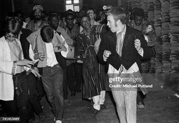 Nigerian percussionist Ginger Johnson and his African conga drummers at the International Love-In Festival, held at Alexandra Palace, London, 29th...