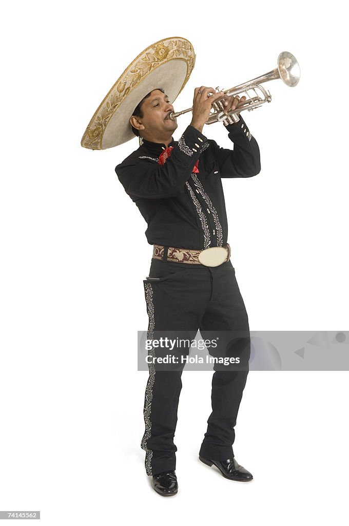 Portrait of Mariachi playing trumpet
