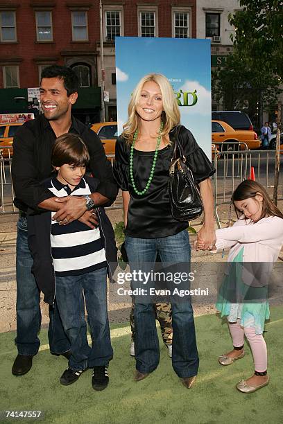 Actors Mark Consuelos and Kelly Ripa pose with their children Michael Joseph and Lola Grace at the premiere of Shrek The Third at Clearview Chelsea...