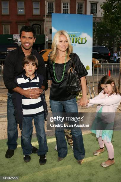 Actors Mark Consuelos and Kelly Ripa pose with their children Michael Joseph and Lola Grace at the premiere of Shrek The Third at Clearview Chelsea...