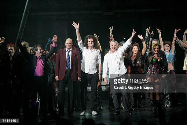 Writer Ben Elton, comedian Al Murray and Queen's Brian May and Roger Taylor appear on stage at the Dominion Theatre as Queen and Ben Elton's We Will...