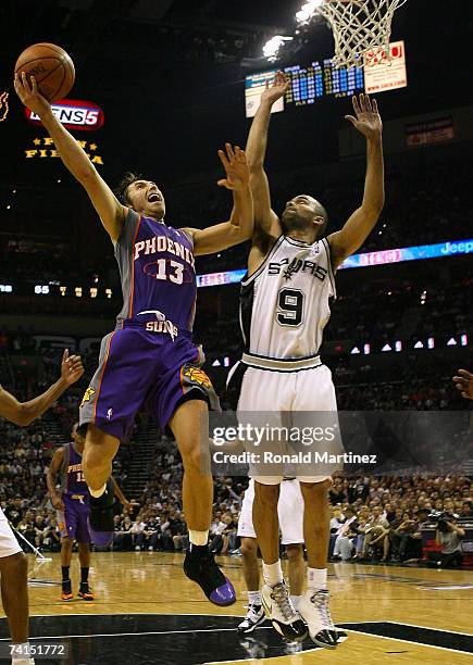 Guard Steve Nash of the Phoenix Suns takes a shot against Tony Parker of the San Antonio Spurs in Game Four of the Western Conference Semifinals...