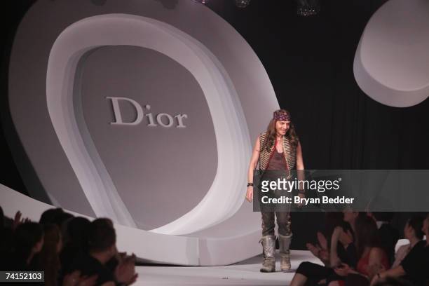 Designer John Galliano takes a bow on the runway at the Dior 2008 Cruise Collection fashion show on May 14, 2007 in New York City.