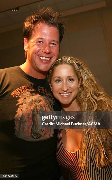 Musician Chris "Abby" Abbondanza of the band "PovertyNeck Hillbillies" and singer Heidi Newfield pose for photos backstage at the first ever Academy...