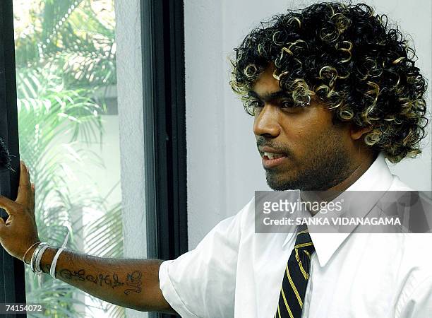 Sri Lankan cricketer Lasith Malinga pauses to answer a question as he...  News Photo - Getty Images