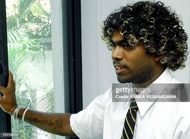 Sri Lankan cricketer Lasith Malinga pauses to answer a question as he... News Photo - Getty Images Sri Lankan cricketer Lasith Malinga pauses to answer a question as he... News Photo - Getty Images