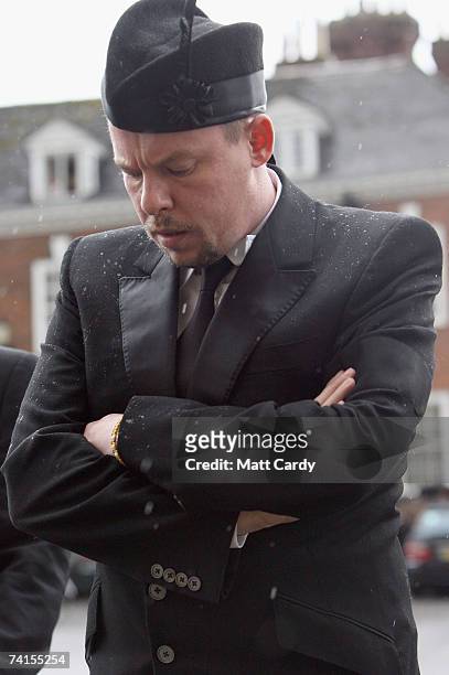 Designer Alexander McQueen arrives for the funeral service for fashion stylist Isabella Blow at Gloucester Cathedral on May 15 2007 in Gloucester,...