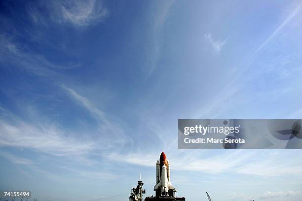 Space Shuttle Atlantis makes the 3.4-mile journey to launch pad 39A at the Kennedy Space Center May 15, 2007 in Cape Canaveral, Florida. Atlantis is...