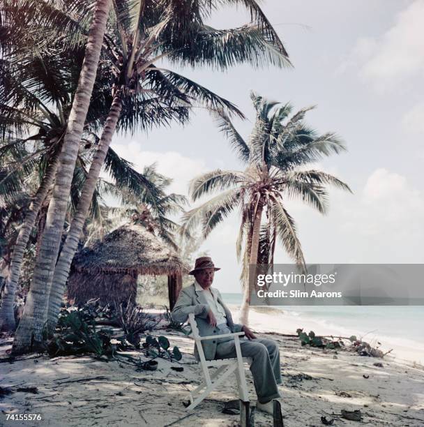 American-born poet and playwright T. S. Eliot at Love Beach, New Providence Island whilst on his honeymoon in the Bahamas, 1957.